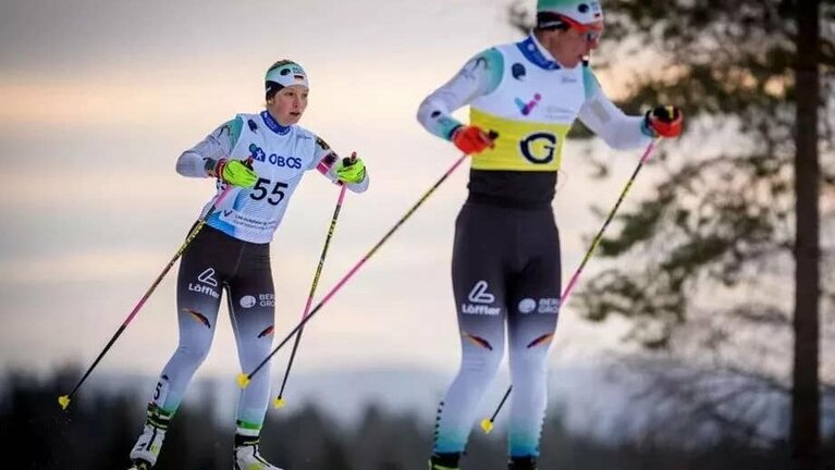 Biathletin mit Guide.