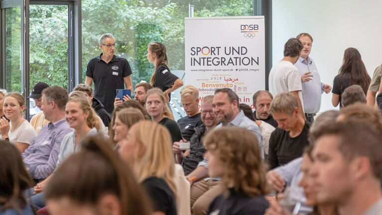 Tagungsteilnehmende auf der Tagung Integration durch Sport