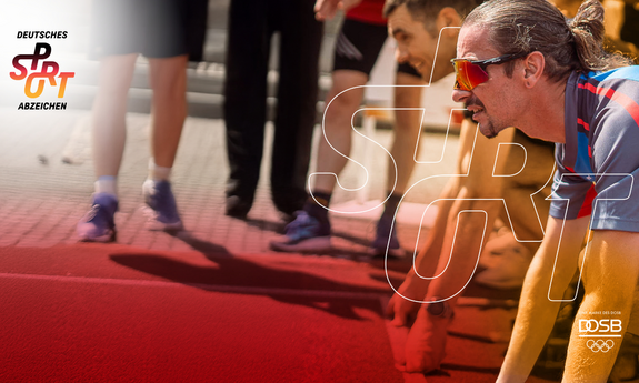 Ein Sportler in Startposition beim Sportabzeichen